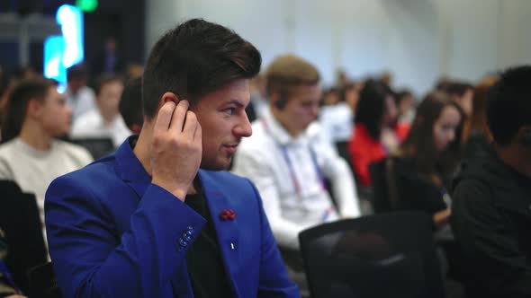 Translate Financial Speaker Headphone Crowd Audience Business Men Conference