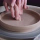 A Woman Works on a Potter's Wheel - VideoHive Item for Sale