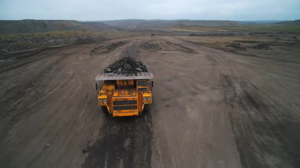 Flying Over a Giant Truck with Coal