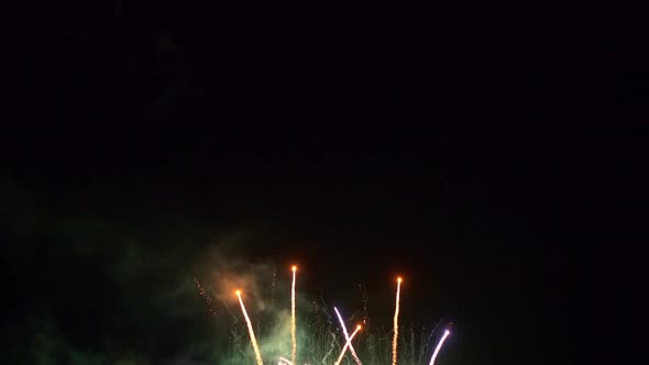 Colorful Firework display at night on sky background