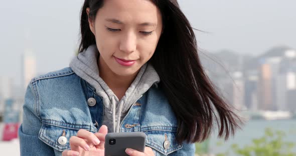 Young woman use of mobile phone