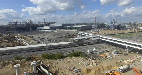 An Aerial Industrial View with Construction Sites and Railways in the Middle of the Scenery