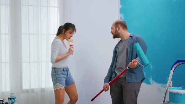 Girl Singing on Paint Brush