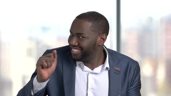 Funny Dark-skinned Man in Formal Wear.