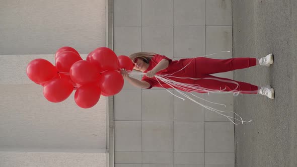 Girl with Red Balls