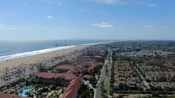 Huntington Beach drone flying over hotel.