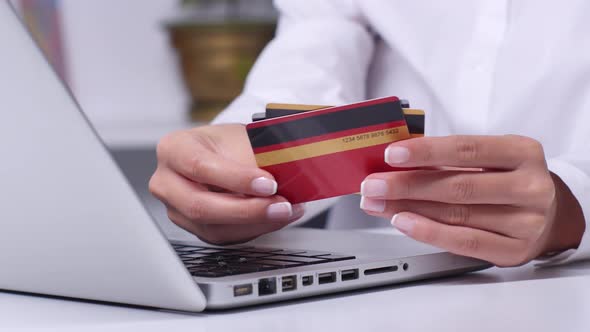 Online Shopping with Many Different Credit Cards. Close Up