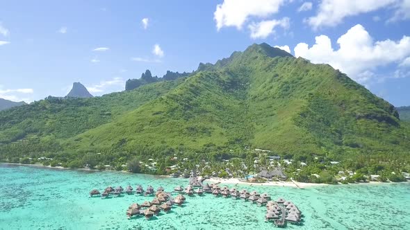 luxury pacific resort hotel Polynesia over water bungalows coral reefs