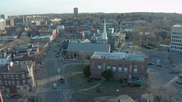 Aerial Drone Shot Flying Past Several Church Steeples in Suburban Boston