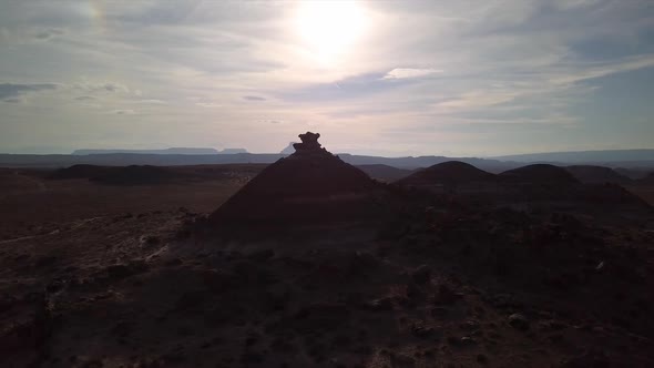 Wide aerial view of pointed hilltop in the Utah desert