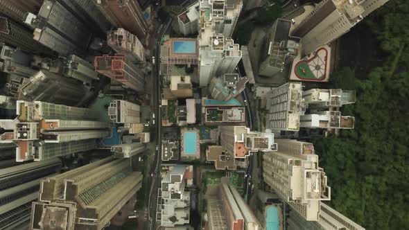 Panning right to left shot, aerial top view of Hong Kong city