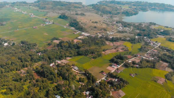 Aerial: lake Toba and Samosir Island view from above Sumatra Indonesia