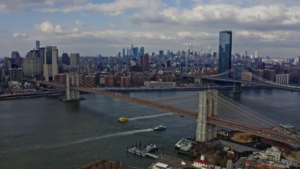 Brooklyn Bridge Traffic with View of Manhattan Skyline