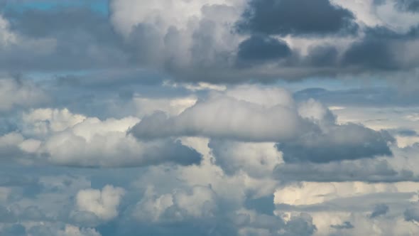 Time Lapse Footage of Fast Moving White Puffy Cumulus Clouds on Blue Clear Sky