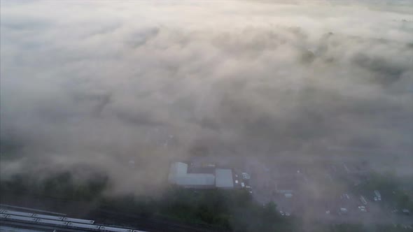 Flying Over Brewster Train Yard on a Foggy Morning at Sunrise