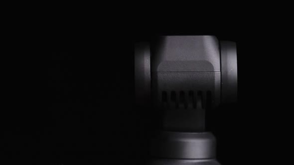 Mechanical Gimbal Camera Lens Rotates on Black Background Robotic Camera Macro