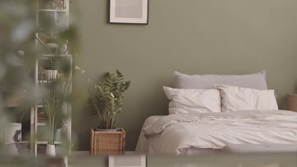 Interior of Eco Style Bedroom with Home Plants