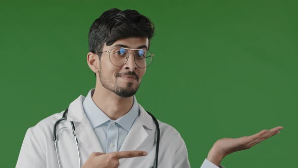 Positive Arabian Handsome Man Doctor Indian Guy Male Dentist Recommend Using Blank Space Point Index