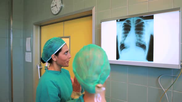 Medical team looking at a Xray