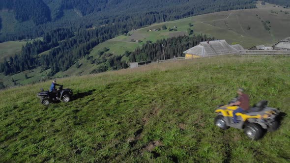 Men Riding ATV Quad Bike at Beautiful Nature Countryside