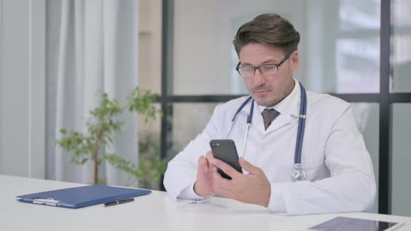 Doctor using Smartphone in Clinic