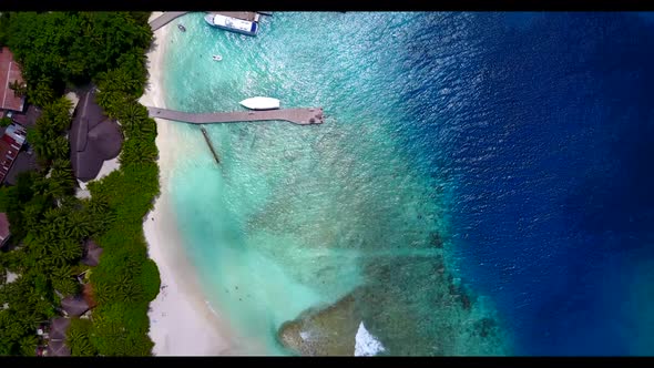 Aerial above abstract of idyllic bay beach trip by blue lagoon and white sandy background of a picni