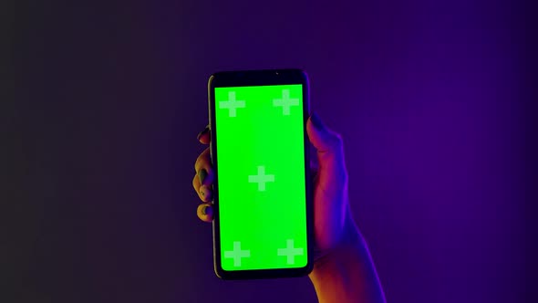 African American Woman Holds Her Hand Smartphone Green Screen Chroma Key