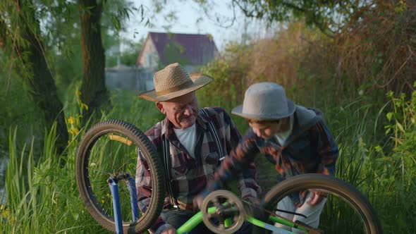 Lifestyle, Happy Elderly Man and Charming Ginny Grandson in Hats Paddle Spend Time Spinning Wheels
