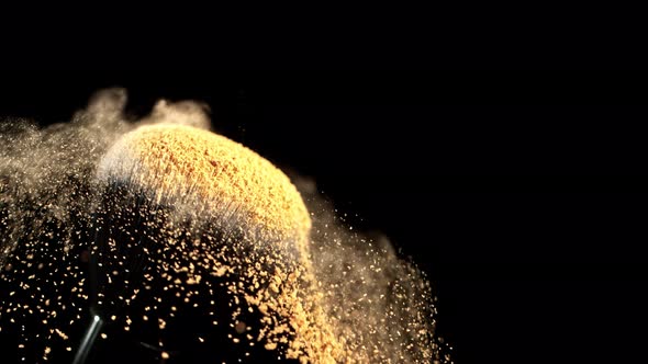 Super Slow Motion Closeup Shot of Makeup Powder Falling From Facial Brush at 1000Fps