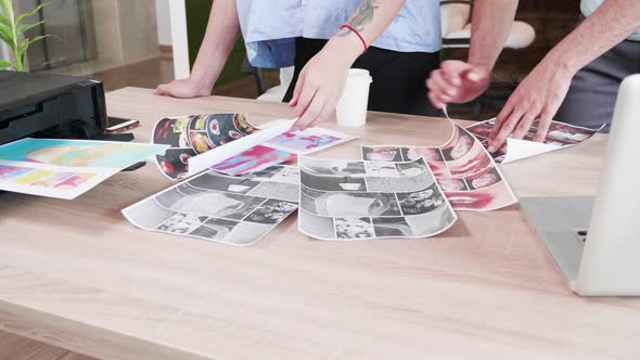 Close Up of Female Art Director Checking the Last Project Tof Her Business Partner