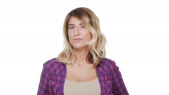 Portrait of Strict Angry Woman Wearing Plaid Shirt Posing on Camera with Meaningful Gaze Saying NO