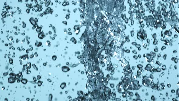 Water pouring and splashing in ultra slow motion 1500fps on a reflective surface - WATER POURS 085