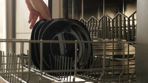 Dishware taking from dishwasher  4K 2160p 30fps UltraHD footage - Close-up of drawer  inside dishwas