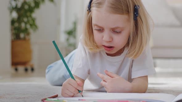 Little Cute Girl Daughter Child Preschool Toddler Kid Blonde Schoolgirl Draws Creative Picture with