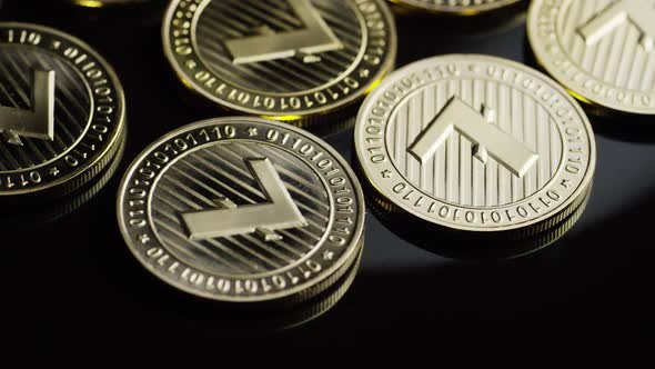 Rotating shot of Bitcoins (digital cryptocurrency) - BITCOIN LITECOIN 