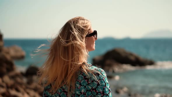 Hair Flying Blowing On Wind In Travelling Adventure Trip.Woman Hair Flowing On Wind.