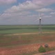 Aerial view of wind turbines energy production and road on fields - VideoHive Item for Sale