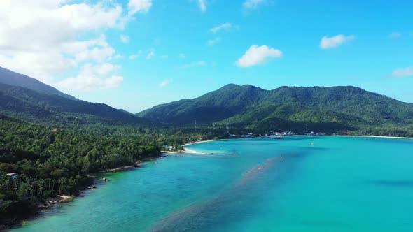 Aerial top down panorama of tropical seashore beach trip by clear water and white sandy background o