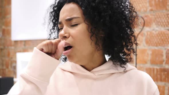 AfroAmerican Woman Coughing Throat Infection Indoor