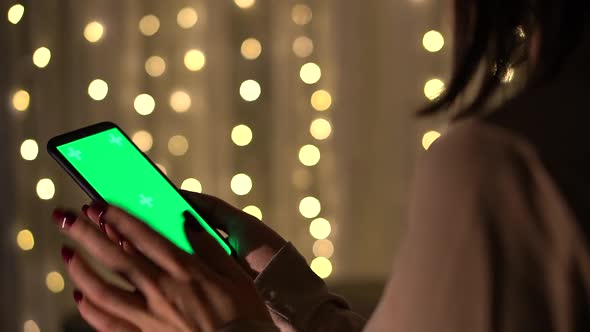 Woman Holding Chroma Key Green Screen Smartphone