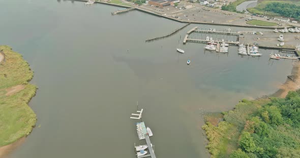 An Aerial View of a Pier Harbor Port with Many Boats