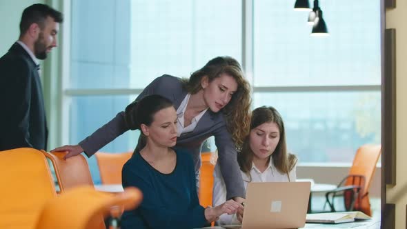 Curios Man Joining Women Discussing Ebusiness Strategy Idea in Office