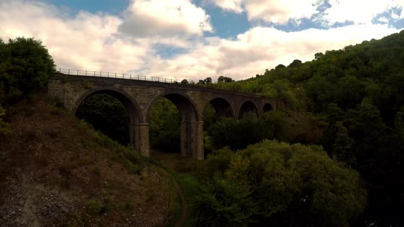 Aerial view of sunset at Headstone Viaduct, bridge, the Peak District National Park, Bakewell, commo