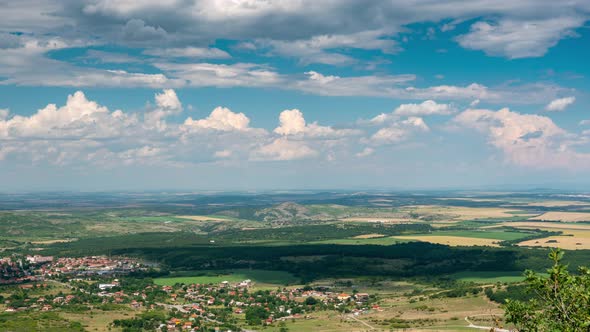 Cloudy Sunny Sky Above Small Town