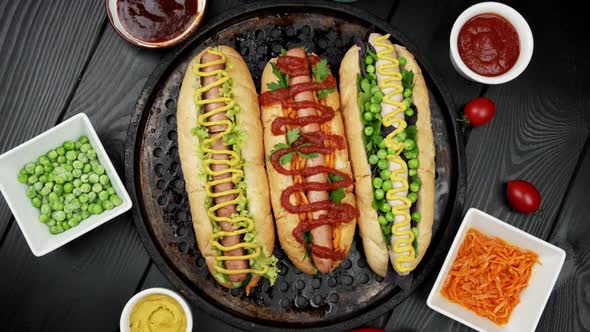 Vegeterian Hot Dogs Served with Tomatoes Avacado Onion and Buns Over Wooden Background