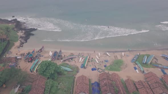 Fishing village on Indian Ocean near Varkala, India. Aerial drone view