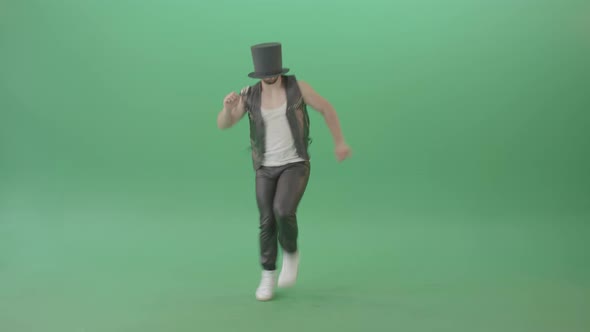 Man In Black Busines Cylinder Hat Dancing And Jumping In Shuffle Dance Isolated On Green Screen