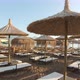 Deckchairs and beach umbrellas. Luxury resort on the beach - VideoHive Item for Sale