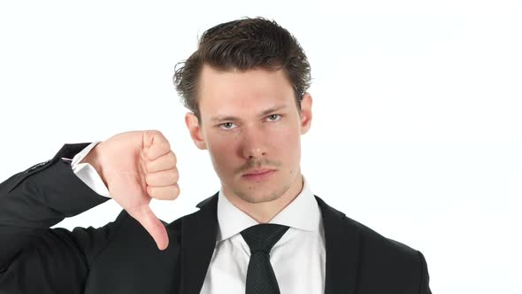 Thumbs Down By Young Businessman on White Background