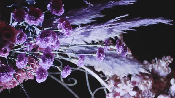 Closeup View of Wedding Floral Decorations of Flowers in Pastel Faded Colors Slow Motion Outside